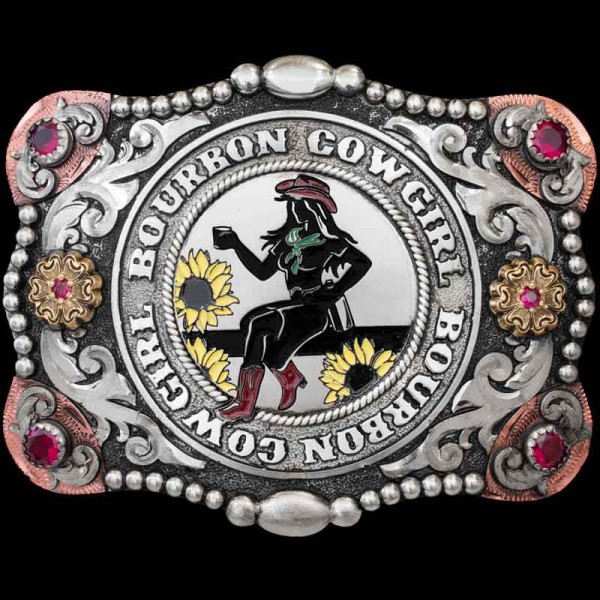 Our Kaycee Buckle will make ya feel like THE ""Rhinestone Cowgirl."" This beautiful Buckle is crafted on a matted, German Silver base with an antique finish. It it detailed with German Silver scrolls, beaded edges, Copper elements in e